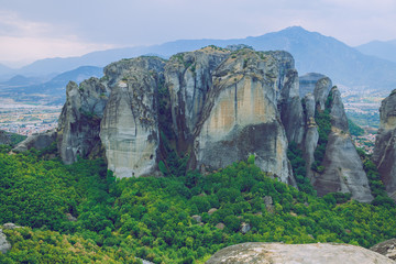 Naklejka premium City Meteora, Greek Republic. Big mountains and places of worship and shrines. 12. Sep. 2019. Travel photo.