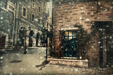 Fototapeta na wymiar Christmas snowfall in town
