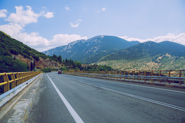 Greek Republic. Way and mountains, grass and trees. 13. Sep. 2019