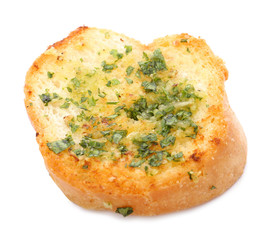 Slice of bread with garlic, cheese and herbs on white background