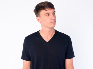 Obraz premium Face of young handsome man thinking and looking away
