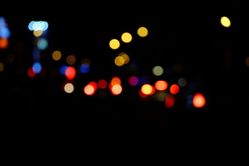 Abstract blurred of blue and silver glittering shine bulbs lights background:blur of Christmas wallpaper decorations concept.christmas light night