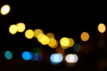 Abstract blurred of blue and silver glittering shine bulbs lights background:blur of Christmas wallpaper decorations concept.christmas light night