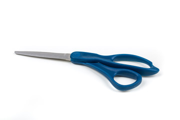 Blue handled pair of metal scissors on a white background
