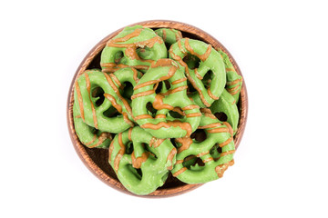 Brown and green caramel apple pretzel treats
