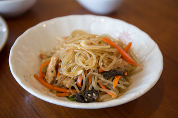 glass noodle with vegetables which is called Japchae in Korea
