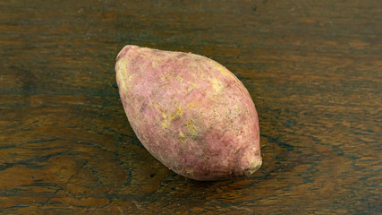 cassava on wood table for food concept.