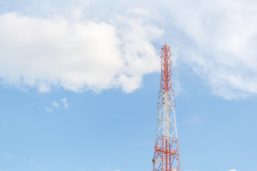 Telecommunication tower on shiny blue sky