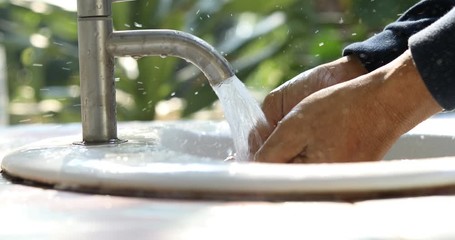 Woman washing hands, washing hands, faucet, clean water