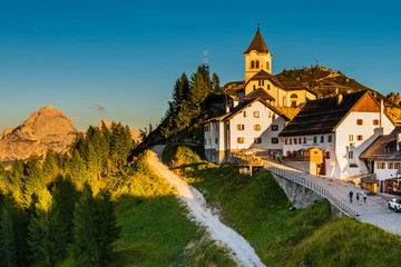 Naklejka premium Sunset on the peaks. Mount Lussari, last lights towards dusk. Italy