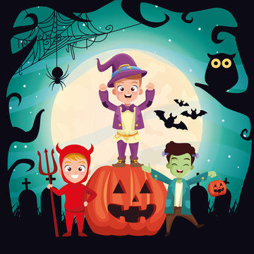 halloween dark scene with kids disguised and pumpkin
