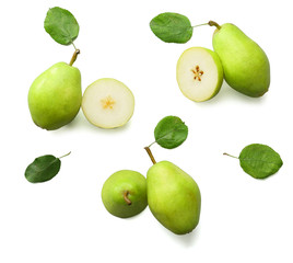 Tasty fresh pears with leaves on white background