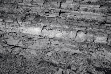 Geological section of soil, layers of coal and rock. Overburden open mine anthracite. Dark texture...