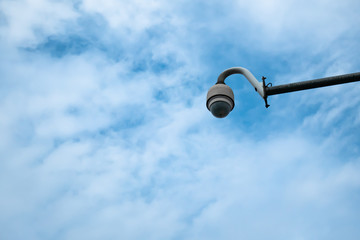 Fototapeta premium outdoor surveillance camera with blue sky