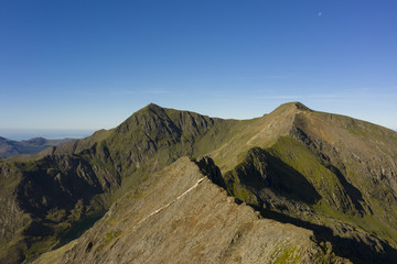 Snowdonia mountain range in Wales, UK with Crib Goch and Mount Snowdon summits