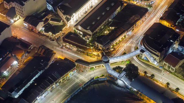 Timelapse aerial view busy night time road traffic of Komtar Pedestrian Flyover at Penang Road (Jalan Penang), Georgetown.