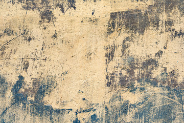 Texture of a concrete wall with cracks and scratches which can be used as a background
