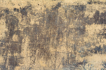 Texture of a concrete wall with cracks and scratches which can be used as a background