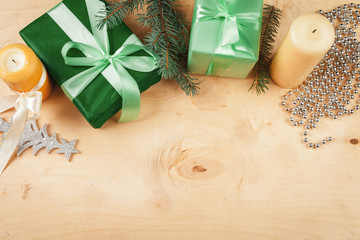 Wooden background copy space with christmas gifts and decorations for your design