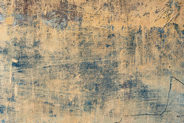 Texture of a concrete wall with cracks and scratches which can be used as a background