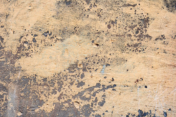 Texture of a concrete wall with cracks and scratches which can be used as a background