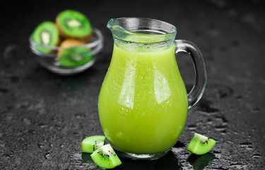 Kiwi Smoothies on a slate slab (selective focus)