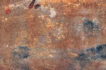 Texture of a concrete wall with cracks and scratches which can be used as a background