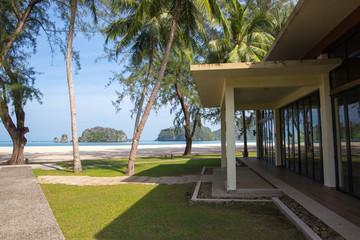 Naklejka premium Modern building on a tropical lonely beach in Malaysia