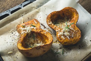 Baked pumpkin with spices and grated cheese