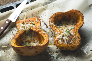 Baked pumpkin with spices and grated cheese