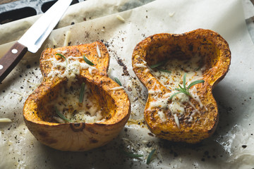 Baked pumpkin with spices and grated cheese