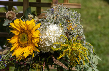 Floristic bouquet of flowers, herbs and fruits that are the symbol of summer