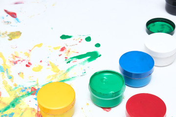 Finger paints. background for advertising from children's finger paint. Copy space. items for the development of children.