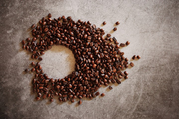 glass of drip coffee and beans on loft background