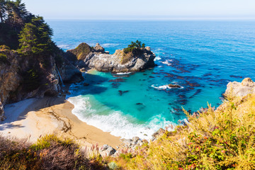Fototapeta premium Stunning view of McWay falls on the coast of Big Sur in central California that flows year-round into the Pacific Ocean
