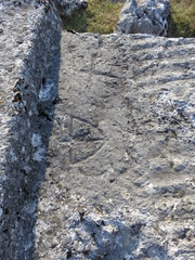 Old stone monument symbols and carvings