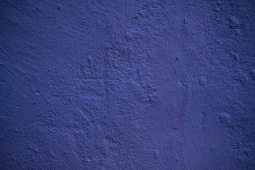 Texture of an old wall covered with paint. Background image of a worn paint coated surface