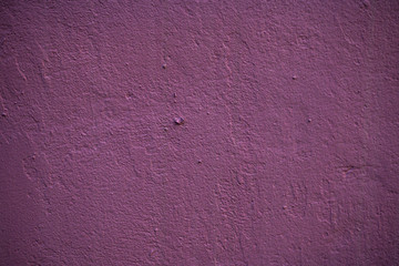 Texture of an old wall covered with paint. Background image of a worn paint coated surface