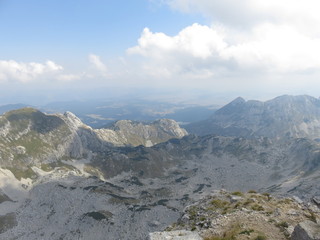A mountain valley with the surrounding mountain range