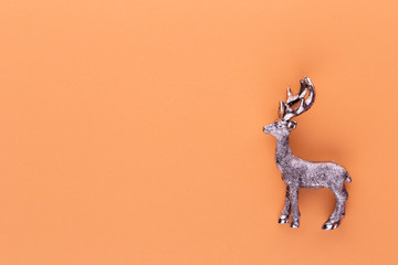 Christmas reindeer on pastel color background. Christmas or New Year minimal concept.