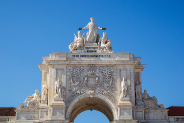 Fototapeta na wymiar Close-up of the 18th century Arco da Rua Augusta, triumphal arch gateway, in Baixa district in Lisbon, Portugal, on a sunny day.