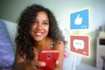 internet social media app likes and chat comments icons composite on young beautiful and happy...