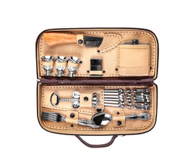 Picnic set in a suitcase isolate on a white background. Luxury set for a picnic. A good gift for friends and acquaintances.
