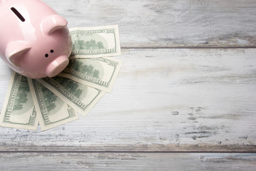 Piggy bank and dollar cash money. Business, finance, investment, saving and corruption concept.
