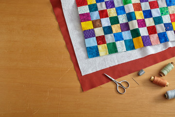 Process of quilt sandwich assembling, sewing accessories