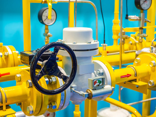 Compressor station in production. Crane for shut off pressure. Gas pipes. Gas unit. A fragment of a...