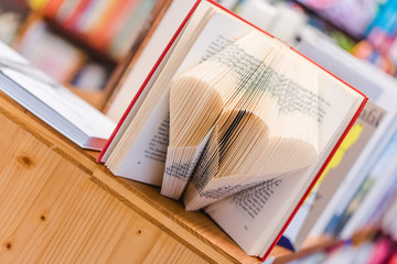 beautiful bookstore with many books on the wooden shelf