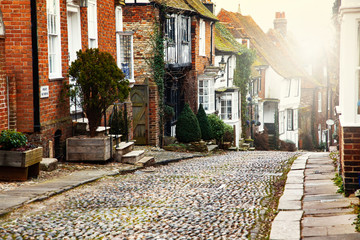 pretty Tudor half timber houses on a cobblestone street at Rye in West Sussex