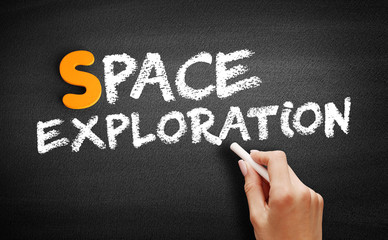 Fototapeta premium Space exploration text on blackboard, concept background