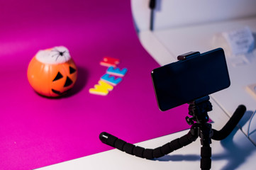 Photography of a table with halloween objects prepared to be photographed.